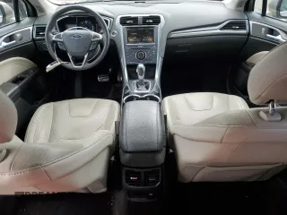 2015 Ford Fusion Titanium Hybrid with VIN 3FA6P0RUXFR115229, listed as a Copart auction lot 54629355 with 76,671 mi miles and Salvage title. Bid and sale history available at DreamBid. Image 8.