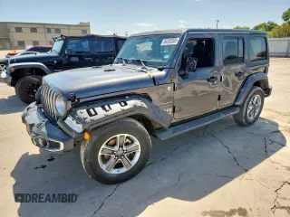 2019 Jeep Wrangler Unlimited Sahara with VIN 1C4HJXEN2KW681016, listed as a Copart auction lot 64333305 with 92,316 mi miles and Salvage title. Bid and sale history available at DreamBid. Image 1.