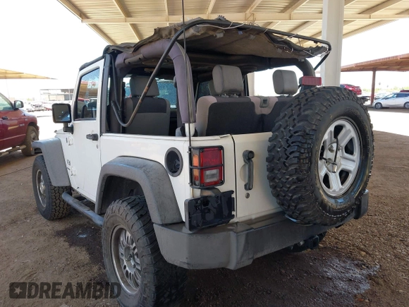 2007 Jeep Wrangler X with VIN 1J4FA24137L128418, listed as a IAAI auction lot 42317921 with 148,412 mi miles and . Bid and sale history available at DreamBid. Image 3.