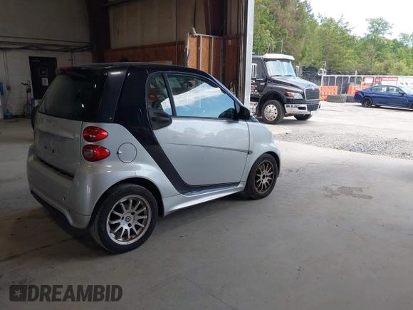 2014 Smart fortwo Pure с VIN WMEEJ3BA3EK750807, выставлен на аукционе IAAI как лот 42603379 с пробегом 99 376 миль миль и . История ставок и продаж доступна на DreamBid. Изображение 4.