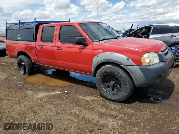 2002 Nissan Frontier XE with VIN 1N6ED29Y12C388949, listed as a Copart auction lot 55235875 with 212,944 mi miles and Salvage title. Bid and sale history available at DreamBid. Image 4.