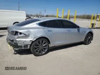 2013 Tesla Model S с VIN 5YJSA1CN5DFP05936, выставлен на аукционе Copart как лот 51831795 с пробегом Не указан миль и Списание • Salvage title. История ставок и продаж доступна на DreamBid. Изображение 3.