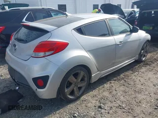 2013 Hyundai Veloster Turbo with VIN KMHTC6AE4DU157798, listed as a IAAI auction lot 42001561 with 163,370 mi miles and . Bid and sale history available at DreamBid. Image 4.
