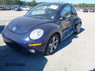 2006 Volkswagen New Beetle Coupe with VIN 3VWSW31C76M418768, listed as a IAAI auction lot 41282506 with 1 mi miles. Bid and sale history available at carsss.com. Image 2.