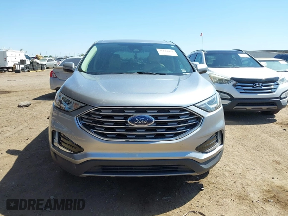 2021 Ford Edge SEL z VIN 2FMPK4J98MBA50772, wystawiony jako IAAI lot #42224052 z przebiegiem 76 061 mil mil oraz . Historia ofert i sprzedaży dostępna na DreamBid. Obrazek 12.