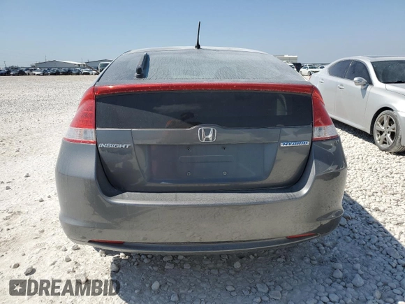 2011 Honda Insight z VIN JHMZE2H36BS005924, wystawiony jako Copart lot #48688355 z przebiegiem 137 345 mil mil oraz Szkoda całkowita • Salvage title. Historia ofert i sprzedaży dostępna na DreamBid. Obrazek 6.