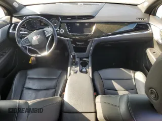 2020 Cadillac XT6 FWD Premium Luxury z VIN 1GYKPCRSXLZ101003, wystawiony jako Copart lot #51844525 z przebiegiem 115 061 mil mil oraz Szkoda całkowita • Salvage title. Historia ofert i sprzedaży dostępna na DreamBid. Obrazek 8.