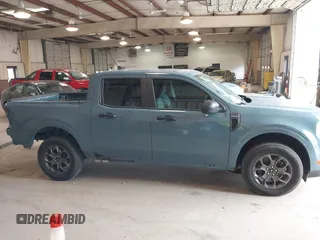 2022 Ford Maverick XL z VIN 3FTTW8F98NRA51950, wystawiony jako IAAI lot #41711759 z przebiegiem 49 476 mil mil oraz . Historia ofert i sprzedaży dostępna na DreamBid. Obrazek 13.