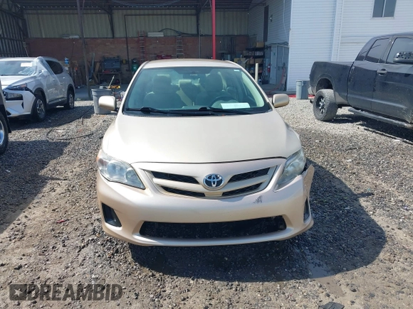 2011 Toyota Corolla L with VIN 2T1BU4EE1BC547635, listed as a IAAI auction lot 42053236 with 121,485 mi miles. Bid and sale history available at carsss.com. Image 12.