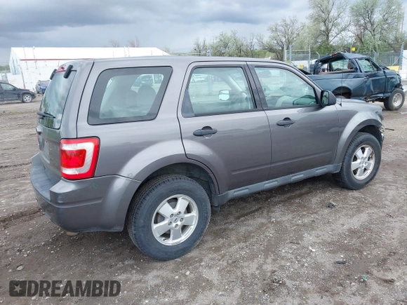 2011 Ford Escape XLS with VIN 1FMCU9C73BKC51595, listed as a IAAI auction lot 42266748 with 204,043 mi miles and . Bid and sale history available at DreamBid. Image 4.