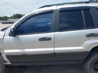 2002 Jeep Grand Cherokee Laredo with VIN 1J4GX48S32C288387, listed as a IAAI auction lot 42212249 with 151,028 mi miles and . Bid and sale history available at DreamBid. Image 15.