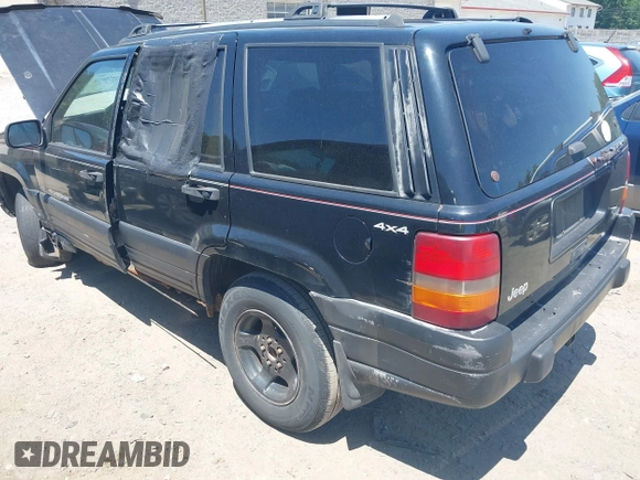 1997 Jeep Grand Cherokee Laredo with VIN 1J4GZ58S3VC508194, listed as a IAAI auction lot 42578622 with 146,559 mi miles and . Bid and sale history available at DreamBid. Image 3.