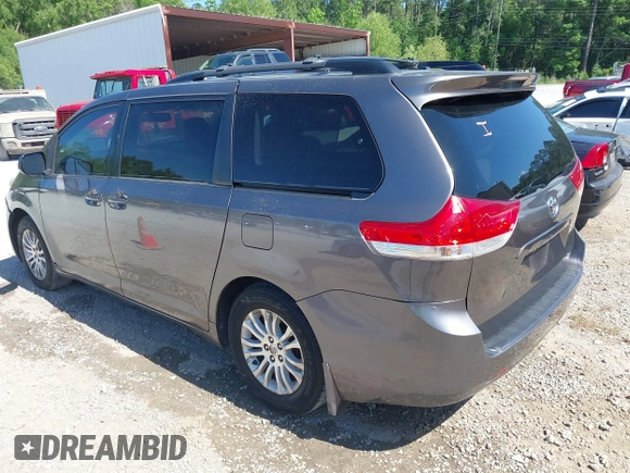 2012 Toyota Sienna XLE AAS with VIN 5TDYK3DC5CS259216, listed as a IAAI auction lot 42143551 with 219,957 mi miles and . Bid and sale history available at DreamBid. Image 3.