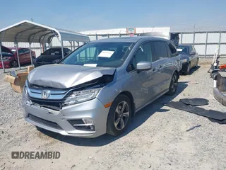 2018 Honda Odyssey Touring with VIN 5FNRL6H84JB070387, listed as a IAAI auction lot 41835852 with 98,662 mi miles. Bid and sale history available at carsss.com. Image 2.