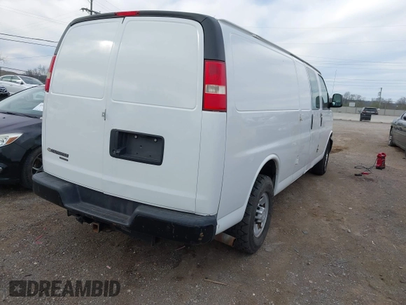 2014 Chevrolet Express Cargo Van with VIN 1GCWGGCA4E1209164, listed as a IAAI auction lot 41838141 with 174,770 mi miles. Bid and sale history available at carsss.com. Image 4.
