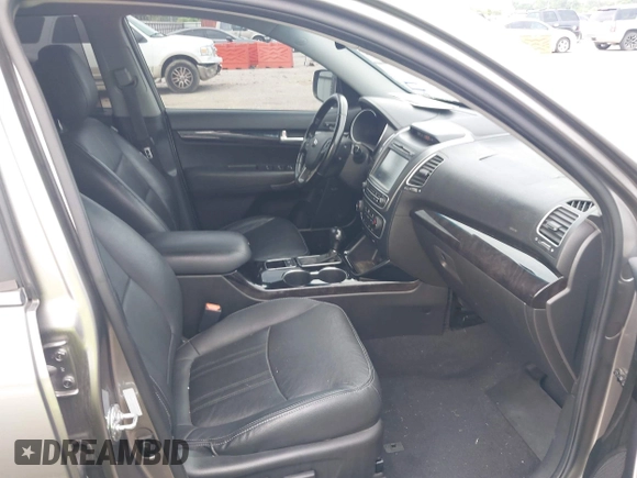 2014 Kia Sorento SX Limited with VIN 5XYKW4A73EG503792, listed as a IAAI auction lot 42684390 with 129,021 mi miles and . Bid and sale history available at DreamBid. Image 5.