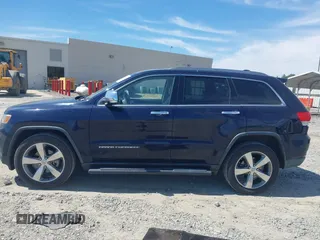 2015 Jeep Grand Cherokee Limited with VIN 1C4RJEBG5FC635136, listed as a IAAI auction lot 41894763 with 229,907 mi miles. Bid and sale history available at carsss.com. Image 14.
