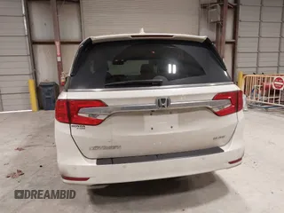2018 Honda Odyssey Elite with VIN 5FNRL6H94JB034739, listed as a IAAI auction lot 41242506 with 96,982 mi miles and . Bid and sale history available at DreamBid. Image 17.