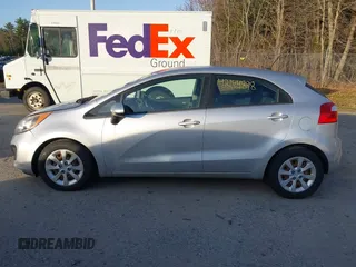 2013 Kia Rio LX with VIN KNADM5A32D6168492, listed as a IAAI auction lot 42144898 with 127,228 mi miles. Bid and sale history available at carsss.com. Image 12.