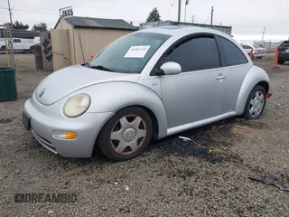 2001 Volkswagen Beetle GLX z VIN 3VWDD21C61M420884, wystawiony jako IAAI lot #40501130 z przebiegiem 179 868 mil mil oraz . Historia ofert i sprzedaży dostępna na DreamBid. Obrazek 17.