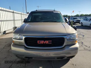 2005 GMC Yukon SLT with VIN 1GKEK13Z05J241613, listed as a Copart auction lot 68125054 with 227,630 mi miles and Salvage Title. Bid and sale history available at carsss.com. Image 5.