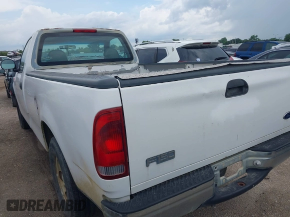 1998 Ford F-150 with VIN 1FTRF1764WKB01383, listed as a IAAI auction lot 42310759 with 51,902 mi miles and . Bid and sale history available at DreamBid. Image 3.