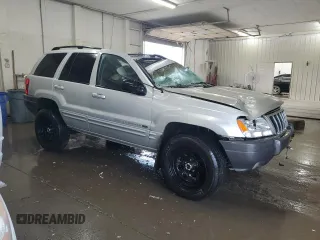 2002 Jeep Grand Cherokee Limited z VIN 1J8GW58S02C279251, wystawiony jako Copart lot #61563465 z przebiegiem 182 244 mil mil oraz Szkoda całkowita • Salvage title. Historia ofert i sprzedaży dostępna na DreamBid. Obrazek 4.