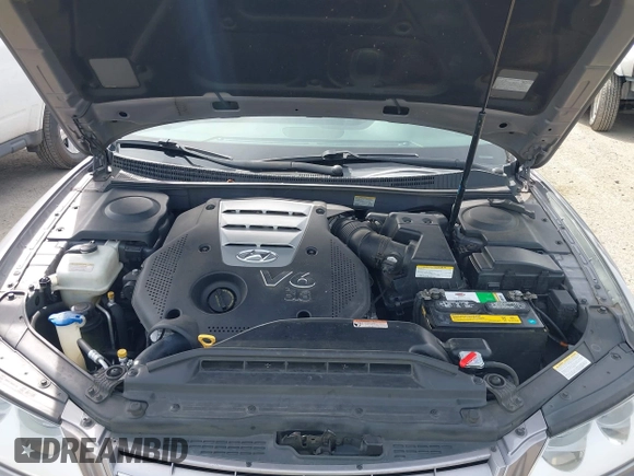 2007 Hyundai Azera SE z VIN KMHFC46F57A141280, wystawiony jako IAAI lot #42214462 z przebiegiem 105 476 mil mil oraz . Historia ofert i sprzedaży dostępna na DreamBid. Obrazek 10.