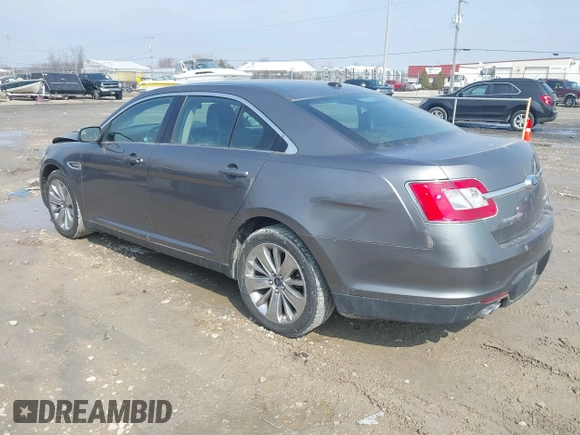 2011 Ford Taurus Limited with VIN 1FAHP2FW5BG163152, listed as a IAAI auction lot 41911683 with 99,798 mi miles and . Bid and sale history available at carsss.com. Image 3.