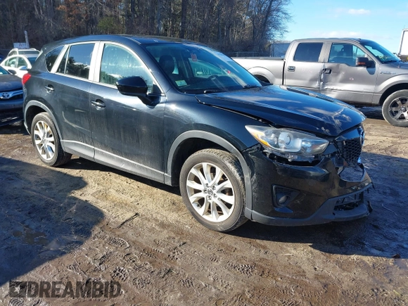 2014 Mazda CX-5 Grand Touring with VIN JM3KE4DY1E0303658, listed as a IAAI auction lot 41536769 with 158,777 mi miles. Bid and sale history available at carsss.com. Image 1.