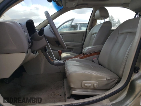 2003 Infiniti I35 Luxury z VIN JNKDA31A03T112340, wystawiony jako Copart lot #67541894 z przebiegiem 177 821 mil mil oraz Czysty tytuł • Clean title. Historia ofert i sprzedaży dostępna na DreamBid. Obrazek 7.