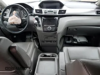 2014 Honda Odyssey Touring z VIN 5FNRL5H91EB089813, wystawiony jako Copart lot #58674275 z przebiegiem Nie podano mil oraz Szkoda całkowita • Salvage title. Historia ofert i sprzedaży dostępna na DreamBid. Obrazek 8.
