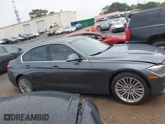 2012 BMW 3 Series 328i with VIN WBA3A5C50CF342321, listed as a IAAI auction lot 41914770 with 185,315 mi miles. Bid and sale history available at carsss.com. Image 13.