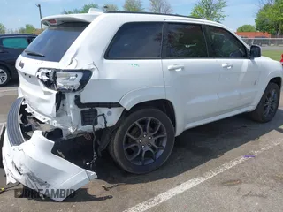 2021 Jeep Grand Cherokee Overland with VIN 1C4RJFCG6MC592296, listed as a IAAI auction lot 42170899 with 56,553 mi miles and . Bid and sale history available at DreamBid. Image 4.