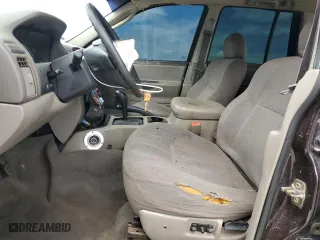 2004 Jeep Grand Cherokee Laredo with VIN 1J4GX48S44C150571, listed as a Copart auction lot 51013675 with 260,986 mi miles and Salvage Title. Bid and sale history available at carsss.com. Image 7.