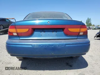 2001 Saturn SL z VIN 1G8ZK547X1Z294553, wystawiony jako Copart lot #53786805 z przebiegiem 288 011 mil mil oraz Szkody całkowita. Historia ofert i sprzedaży dostępna na DreamBid. Obrazek 6.