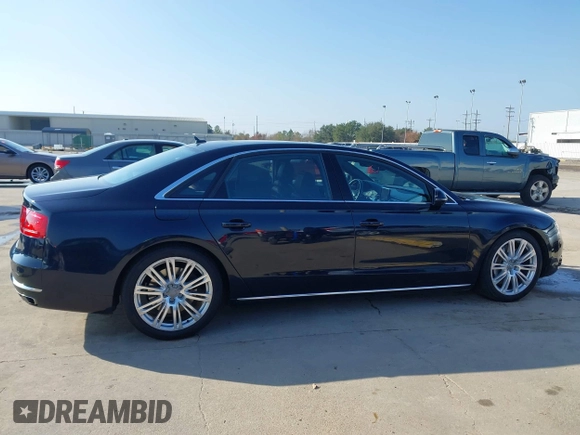 2013 Audi A8 L 4.0L with VIN WAUR2AFD3DN012893, listed as a IAAI auction lot 41209419 with 116,990 mi miles. Bid and sale history available at carsss.com. Image 13.