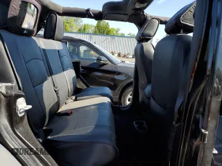 2015 Jeep Wrangler Unlimited Freedom with VIN 1C4BJWDG8FL689194, listed as a Copart auction lot 58016385 with 108,026 mi miles and Salvage title. Bid and sale history available at DreamBid. Image 10.