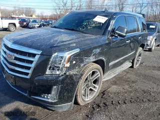2019 Cadillac Escalade Luxury with VIN 1GYS4BKJ5KR354572, listed as a IAAI auction lot 41071039 with 98,256 mi miles. Bid and sale history available at carsss.com. Image 2.