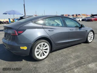 2022 Tesla Model 3 with VIN 5YJ3E1EA1NF372879, listed as a Copart auction lot 71604604 with 60,925 mi miles and Salvage Title. Bid and sale history available at carsss.com. Image 3.