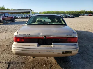 1997 Mercury Grand Marquis LS with VIN 2MELM75W3VX692074, listed as a Copart auction lot 52542335 with 211,850 mi miles and Salvage Title. Bid and sale history available at DreamBid. Image 6.