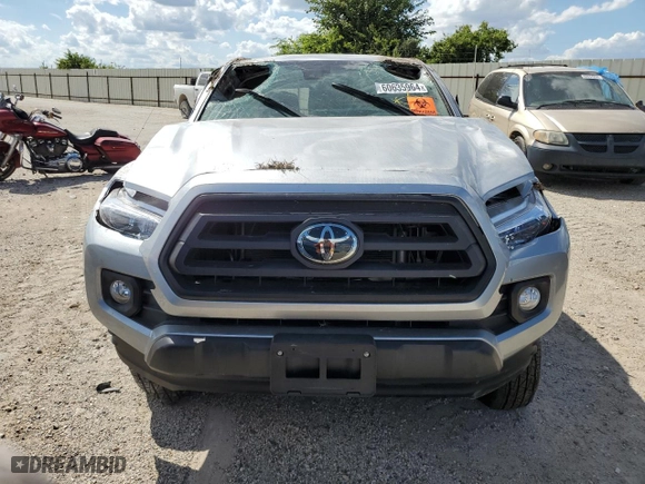 2023 Toyota Tacoma 2WD SR5 with VIN 3TMBZ5DN1PM040211, listed as a Copart auction lot 60635964 with 0 mi miles and Salvage Title. Bid and sale history available at carsss.com. Image 5.