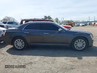 2013 Chrysler 300 C with VIN 2C3CCAKT2DH567348, listed as a IAAI auction lot 41909284 with 110,710 mi miles and . Bid and sale history available at DreamBid. Image 13.