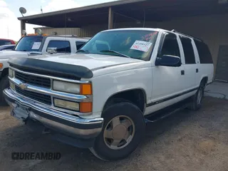 1997 Chevrolet Suburban with VIN 3GNFK16R2VG141730, listed as a IAAI auction lot 42208327 with 158,448 mi miles and . Bid and sale history available at DreamBid. Image 2.