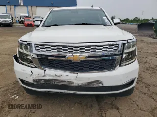 2015 Chevrolet Suburban LT z VIN 1GNSKJKC5FR261474, wystawiony jako Copart lot #60679775 z przebiegiem 128 851 mil mil oraz Czysty tytuł • Clean title. Historia ofert i sprzedaży dostępna na DreamBid. Obrazek 5.