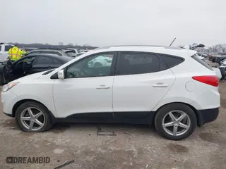 2013 Hyundai Tucson GLS with VIN KM8JU3AC2DU561443, listed as a IAAI auction lot 41600727 with 179,694 mi miles. Bid and sale history available at carsss.com. Image 14.