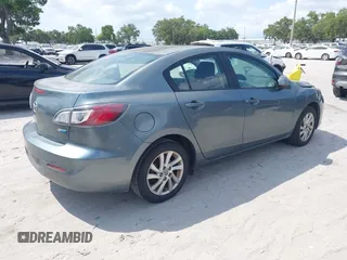 2012 Mazda 3 i Touring with VIN JM1BL1V70C1664809, listed as a IAAI auction lot 42213459 with 331,525 mi miles and . Bid and sale history available at DreamBid. Image 4.