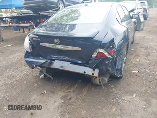 2014 Nissan Maxima SV with VIN 1N4AA5AP9EC451594, listed as a IAAI auction lot 42276826 with 130,372 mi miles and . Bid and sale history available at DreamBid. Image 6.