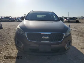 2016 Kia Sorento L with VIN 5XYPG4A39GG047719, listed as a Copart auction lot 52496625 with 135,632 mi miles and Clean Title. Bid and sale history available at carsss.com. Image 5.