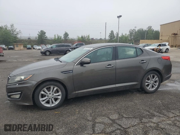2013 Kia Optima EX z VIN 5XXGN4A70DG207530, wystawiony jako Copart lot #58270795 z przebiegiem 188 998 mil mil oraz Szkoda całkowita • Salvage title. Historia ofert i sprzedaży dostępna na DreamBid. Obrazek 1.
